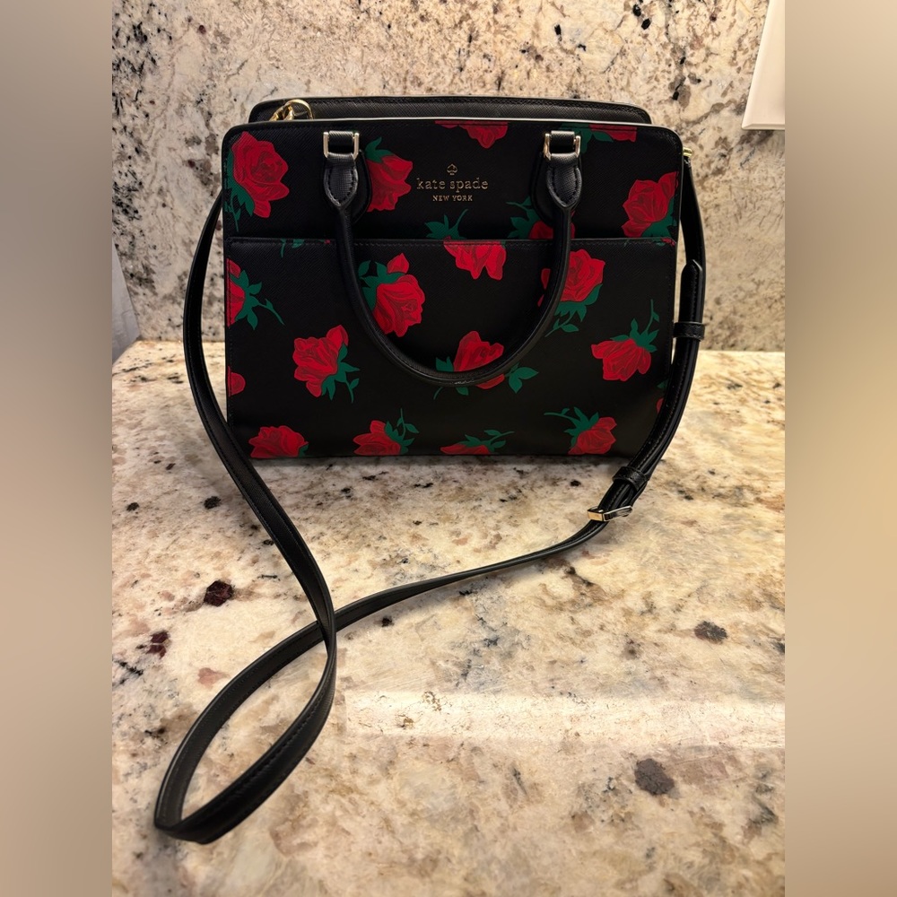 Brand new Kate Spade leather purse w/o tags worn twice in perfect condition